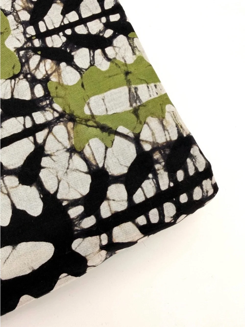 Hand Blocked Black, White & Olive Green Batik Cotton Cambric Fabric. 44” wide.